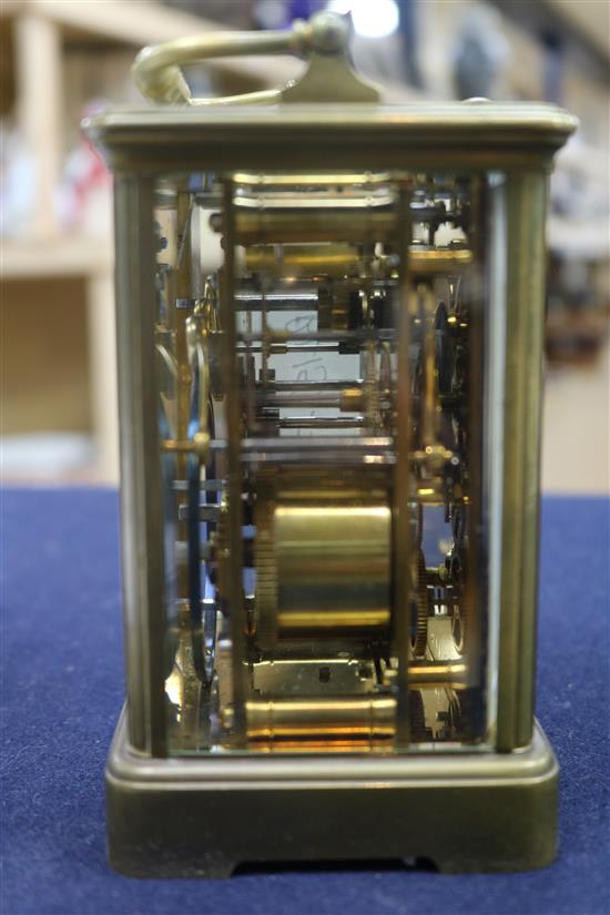 A French eight day repeating carriage clock, retailed by Camerer Kuss